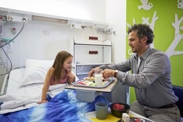 Breakfast at bed with the parent